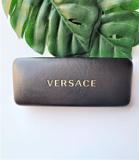 versace eyeglass case hard black.